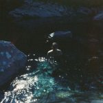Film Reflection - man swimming in river