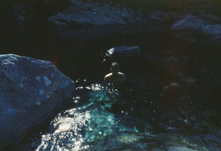 Film Reflection - man swimming in river