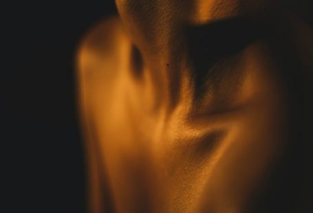 Body Language: Cultural Communication - a blurry photo of a person's torso
