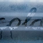 Word Origin. - water droplets on glass panel
