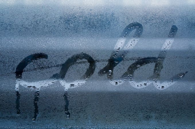 Word Origin. - water droplets on glass panel